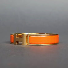 Load image into Gallery viewer, Vintage Hermès ‘clic clac’ bracelet with enamel & gold plate