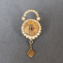 Load image into Gallery viewer, Antique Victorian era padlock brooch with pearl border, and keyhole set with a ruby and emerald. Inscribed with the Latin motto Coer Souvenir meaning Remember the Heart. With a dangling gold heart and hair in glass compartment. Anniversary gift. Wedding gift.