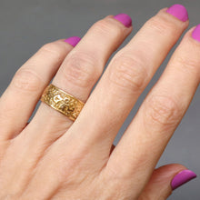 Load image into Gallery viewer, Antique Victorian era wide gold stacking band ring in 18ct gold. Antique wedding ring with embossed ivy leaf design around full circumference. Ivy leaf symbolising fidelity, loyalty, devotion. Anniversary gift ring.