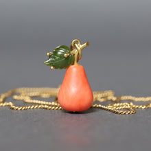 Load image into Gallery viewer, Vintage Italian coral figural pendant necklace in the shape of a pear with nephrite jade leaf and gold fittings. Vintage Italian curb link chain necklace in 18ct 18k yellow gold by UnoAErre. 1960s mid-century pear pendant and necklace.