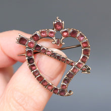 Load image into Gallery viewer, Georgian jewellery. Georgian jewelry. Georgian brooch. Georgian witch's heart. Georgian witches heart. Georgian witch heart. Witch's heart brooch. Witches heart brooch. Witch heart brooch. Antique witch heart brooch. Antique witch's heart brooch. Antique witches heart brooch. Flat cut garnet. Antique garnet brooch. Antique garnets. Foil back garnets. Heart and arrow brooch. Antique heart and arrow brooch. Georgian heart and arrow brooch.