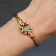 Load image into Gallery viewer, Antique horseshoe bangle. Horseshoe bangle. Gold horseshoe bangle. Victorian horseshoe bangle. Coral and turquoise horseshoe bangle. Coral horseshoe bangle. Turquoise horseshoe bangle. Vintage horseshoe bangle. Horseshoe bracelet. Horseshoe cuff. Antique horseshoe bracelet. Vintage horseshoe bracelet.