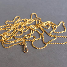 Load image into Gallery viewer, Long guard chain. Antique chain. Antique gold chain. Muff chain. Antique guard chain. Rope link chain. Antique rope link chain. Twist link chain. Antique twist link chain. Swivel clasp. Lobster clasp. Gold dog clip. Antique dog clip. Charm holder.
