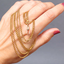 Load image into Gallery viewer, Long guard chain. Antique chain. Antique gold chain. Muff chain. Antique guard chain. Rope link chain. Antique rope link chain. Twist link chain. Antique twist link chain. Swivel clasp. Lobster clasp. Gold dog clip. Antique dog clip. Charm holder.