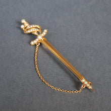 Load image into Gallery viewer, Antique sword brooch. Antique sword pin. Sword brooch. Sword pin. Gold sword brooch. Gold sword pin. Victorian sword brooch. Victorian sword pin. Pearl sword brooch. Pearl sword pin. Sword lapel pin. Antique lapel pin.