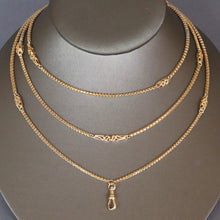 Load image into Gallery viewer, Long guard chain. Antique chain. Antique gold chain. Muff chain. Antique guard chain. Fancy link chain. Antique fancy link chain. Pierced link chain. Antique pierced link chain. Swivel clasp. Lobster clasp. Gold dog clip. Antique dog clip. Station link chain. Station chain.