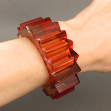 Load image into Gallery viewer, Vintage Prystal transparent Bakelite bangle cuff bracelet. Spiky spiked. Bold. Statement. Sculptural. Mid-century. Burnt orange colour.