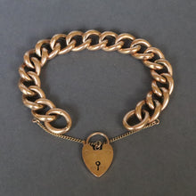 Load image into Gallery viewer, Antique chunky curb link bracelet with heart padlock in 9ct gold