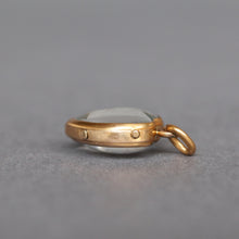 Load image into Gallery viewer, Antique puffy heart locket with glass leaves and yellow gold gilding