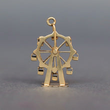 Load image into Gallery viewer, Vintage spinning ferris wheel charm in 14ct 14k yellow gold. Articluated ferris wheel pendant. Ferris wheel spins and cars carts swing. Whimsical gold charm.