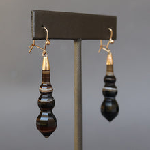 Load image into Gallery viewer, Antique Victorian era banded agate torpedo drop earrings. Brown cream colour. Gold filled ear hooks. Faceted design with graduated spheres ending at a point.