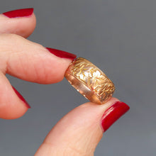 Load image into Gallery viewer, Antique Edwardian era wide wedding stacking band with ivy leaf engraving in 9ct yellow gold.