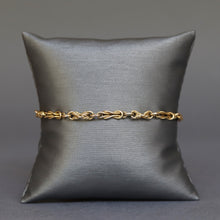 Load image into Gallery viewer, Vintage gold bracelet. Vintage knot link bracelet. Fancy link bracelet. Triple link gold bracelet. Lover's knot bracelet. Hamilton knot bracelet. Round link bracelet. Thin, classic gold bracelet. Large size gold bracelet.