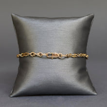 Load image into Gallery viewer, Vintage triple link knot bracelet in 9ct gold