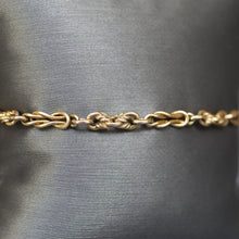 Load image into Gallery viewer, Vintage triple link knot bracelet in 9ct gold