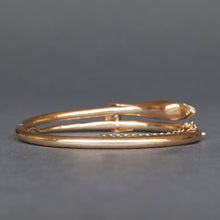 Load image into Gallery viewer, Antique snake bypass bangle with garnet in 14ct gold