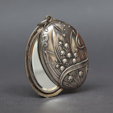 Load image into Gallery viewer, Antique art nouveau slide locket with double sided mirror. Locket with lily of the valley decoration. Large art nouveau silver locket. Repousse art nouveau locket.