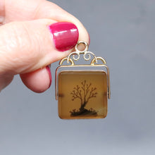 Load image into Gallery viewer, Vintage mid-century spinner pendant set with brown dendritic agate in a vermeil frame.