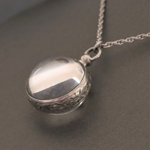 Load image into Gallery viewer, Vintage 'Pool of Light' locket with twist chain in sterling silver