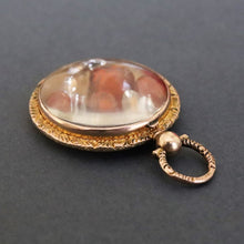 Load image into Gallery viewer, Antique Edwardian era locket in 9ct gold with garnets & sapphires