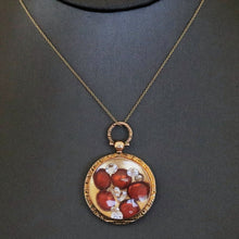 Load image into Gallery viewer, Antique Edwardian era locket in 9ct gold with garnets & sapphires