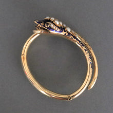 Load image into Gallery viewer, Antique Victorian era pearl, garnet & enamel snake bangle in 14ct gold