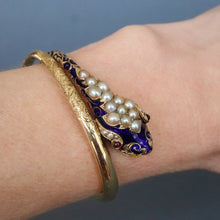 Load image into Gallery viewer, Antique Victorian era pearl, garnet & enamel snake bangle in 14ct gold