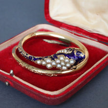 Load image into Gallery viewer, Antique Victorian era pearl, garnet & enamel snake bangle in 14ct gold