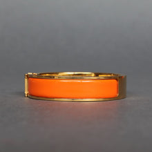 Load image into Gallery viewer, Vintage Hermès ‘clic clac’ bracelet with enamel &amp; gold plate
