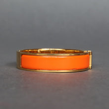 Load image into Gallery viewer, Vintage Hermès ‘clic clac’ bracelet with enamel &amp; gold plate
