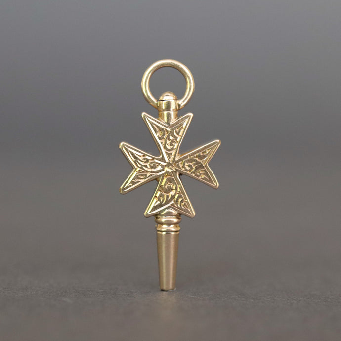 Maltese cross watch key. Gold Maltese cross watch key. Victorian watch key. Maltese cross pendant. Antique watch key. Antique gold watch key. Antique Maltese cross. Figural watch key. Gold Maltese cross. Watch key pendant. Gold cross pendant. Antique cross pendant. 