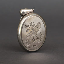 Load image into Gallery viewer, Antique Aesthetic movement locket dating to the Victorian era with engraved wading stork and songbird in multicoloured enamel. Oval locket. Birth present. Baby gift. Push present.
