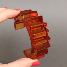 Load image into Gallery viewer, Vintage mid-century &#39;Prystal&#39; Bakelite cuff in burnt orange
