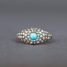 Load image into Gallery viewer, Antique Victorian era cluster ring with seed pearls and cabochon cut blue turquoise to a 14ct yellow gold band with a domed profile.
