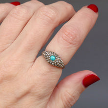 Load image into Gallery viewer, Antique Victorian era cluster ring with seed pearls and cabochon cut blue turquoise to a 14ct yellow gold band with a domed profile.
