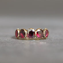 Load image into Gallery viewer, Antique Georgian flat cut garnet ring in 14ct yellow gold with engraved split shoulders. Oval garnets in a five stone half-hoop band. Foil-backed garnets. Foiled garnet ring.
