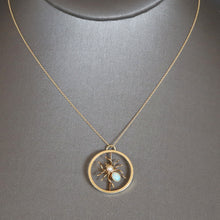 Load image into Gallery viewer, Vintage mid-century spider converter pendant brooch with engraved bow mount. Spider as an opal and pearl to the abdomen with gold body. Halloween jewellery jewelry jewels.
