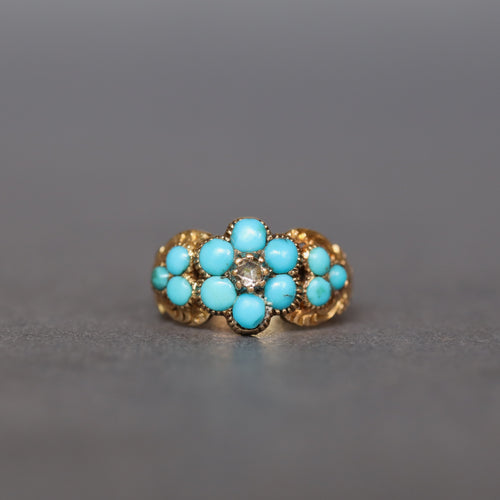 Antique Victorian era mourning ring with turquoise and diamond in a forget-me-not design. Pinky ring.