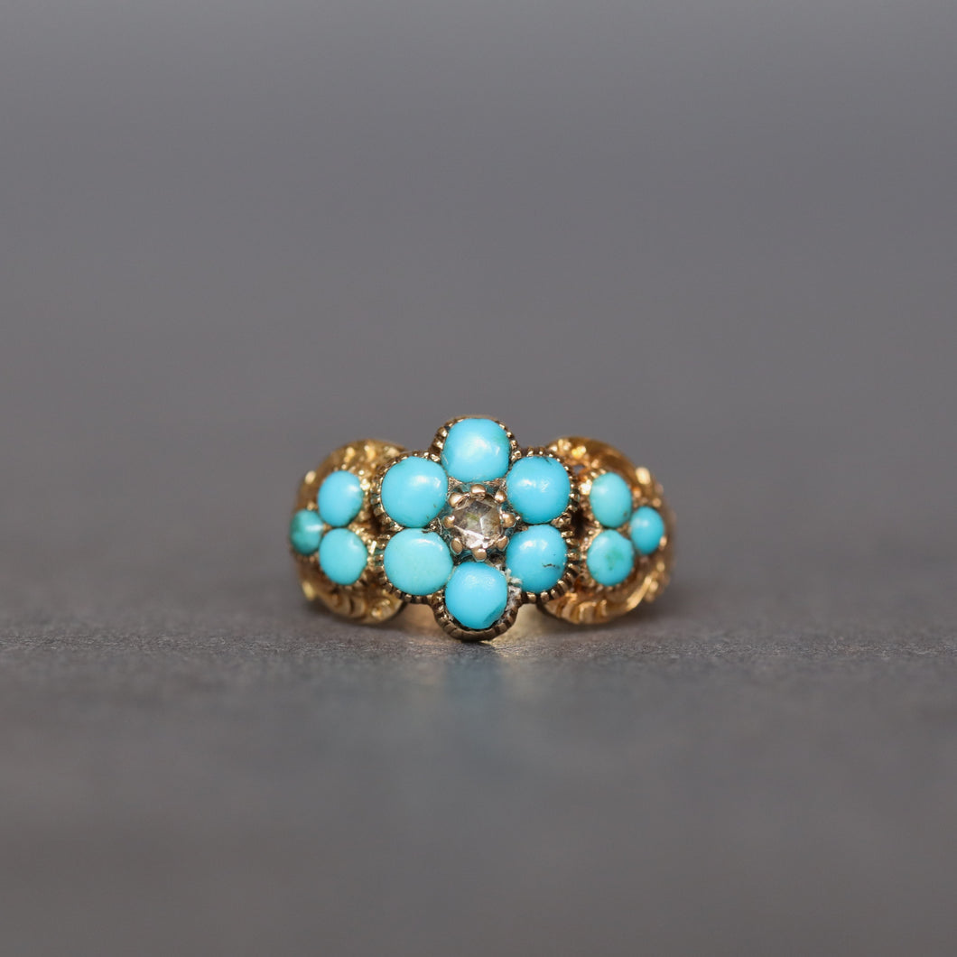 Antique Victorian era mourning ring with turquoise and diamond in a forget-me-not design. Pinky ring.