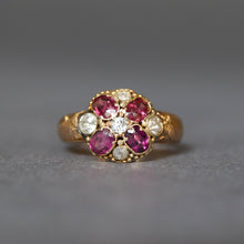 Load image into Gallery viewer, Antique Victorian era cluster ring with oval cut garnets and old cut diamonds in a flower design with a rose gold band.
