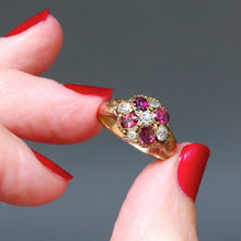 Load image into Gallery viewer, Antique Victorian era cluster ring with oval cut garnets and old cut diamonds in a flower design with a rose gold band.
