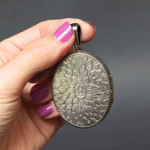 Load image into Gallery viewer, Large antique Victorian era oval shaped locket with leaf design and monogram CM or MC in sterling silver.
