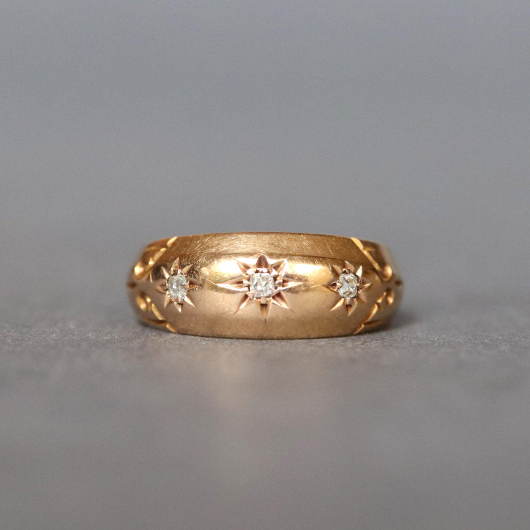 Antique Edwardian era three stone diamond gypsy stacking ring band with star setting in 18ct yellow gold and engraving to shoulders.