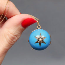 Load image into Gallery viewer, Antique ball pendant. Antique ball locket. Sphere locket. Sphere pendant. Orb locket. Orb pendant. Antique blue enamel star locket. Cerulean blue enamel locket. Star locket with pearl. Antique double-sided locket.
