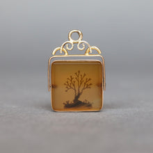 Load image into Gallery viewer, Vintage mid-century spinner pendant set with brown dendritic agate in a vermeil frame.
