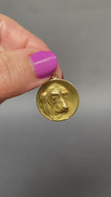 Load and play video in Gallery viewer, Antique art nouveau era French pendant with basset hound dog in relief. Circular circle disc pendant in 18ct yellow gold.
