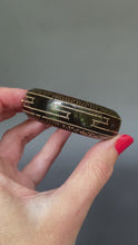 Load and play video in Gallery viewer, Antique Victorian pique tortoiseshell bangle bracelet with gold Greek key and star pattern motif.
